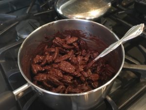 Pecans in melted chocolate