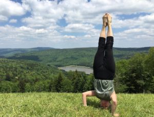 Headstand on the edge of the world Wanderlust 2017